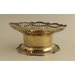 A silver gilt bowl, with shaped pierced edge and foot rim, Sheffield 1919, weight 18oz, diameter 8.