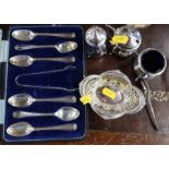 A collection of hallmarked silver, to include a three pieces condiment set, a cased set of spoons