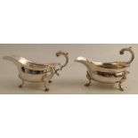 An 18th century silver sauce boat, with C scroll handle, London 1741, weight 10oz, together with