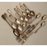 A collection of silver fiddle and thread pattern flatware, to include a basting spoon, serving