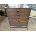 A  small 19th century faux bois painted pine chest of drawers, with oak graining, width 23.5ins,