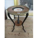 A 19th century gilt metal mounted walnut and ebonized and floral inlay table inset to the top with a