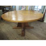 A Robert 'Mouseman' Thompson of Kilburn oak circular dining table, with adze top, width 57ins,
