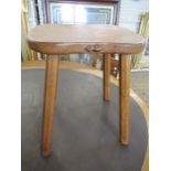 A Robert 'Mouseman' Thompson of Kilburn four legged oak stool, width 14.5ins, height 18ins