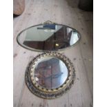 Two 20th century mirrors, one with oval shape and scroll surround, 98 cm x 60cm, together with