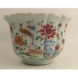 A Chinese jardinere, decorated in colours with flowers, fabulous birds, foliage and fence,