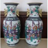 A large pair of 19th century Chinese Famille Rose vases, of baluster shape, with applied handles