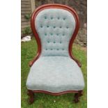 A Victorian mahogany showwood chair, with button back