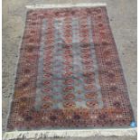 An Oriental design rug, 72ins x 50ins