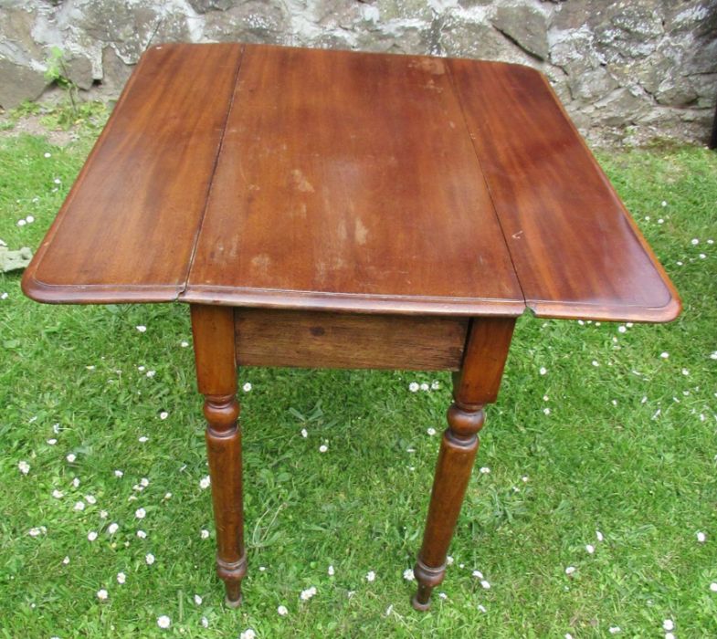 A 19th century mahogany Pembroke table, fitted with an end drawer, 35ins x 32ins