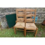 A set of 4 rush seated chairs and folding card table