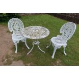 A garden table and two matching chairs
