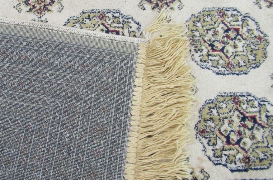 An Eastern design rug, in blue and ream, 62ins x 88ins - Image 3 of 3