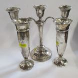 A silver three light candelabrum, Birmingham 1990, together with a pair of trumpet vases (17 & 24)
