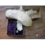 A glove box, with gloves and glove stretchers, together with a fur stole