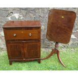 A 19th century mahogany cupboard, fitted with a drawer over a pair of cupboard doors, 25ins x 16ins,