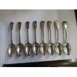 A set of eight silver fiddle pattern dessert spoons, engraved with a P, London 1810, weight 11oz (