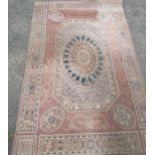 A Belgium made rug, decorated in the Classic French style, 52ins x 78ins