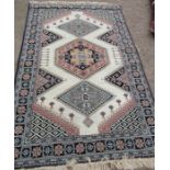 A Kazak Turkish rug, 90ins x 59ins