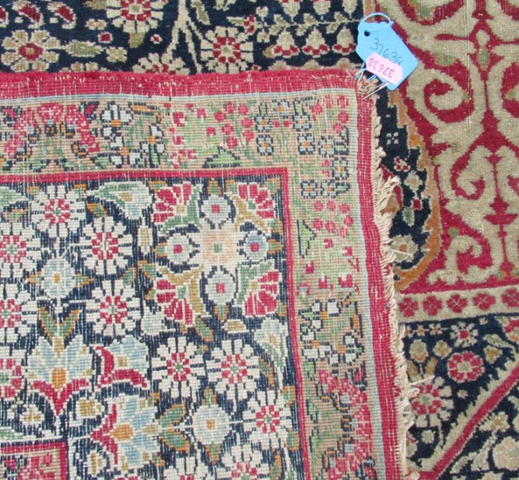 An Eastern design pray rug, the field decorated with a vase of flowers, 56ins x 84ins, together with - Image 3 of 5