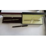 A boxed Dunhill propelling pencil, together with a Dunhill fountain pen and a boxed hallmarked