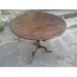 A 19th century tripod table, diameter 30ins, height 28ins