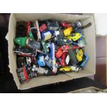 A collection of unboxed Corgi and other toy cars