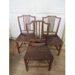 Three early 19th century mahogany saddle seated chairs, with five reeded bar spindles to the back