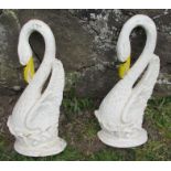 A pair of cast iron painted Swan door stops, numbered 3105, height 16ins