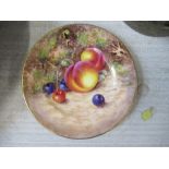 A Royal Worcester side plate, decorated with fruit to a mossy background by Freeman, diameter 6ins -