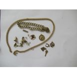 A 9ct gold curb link bracelet, weight 23g, together with various charms, four marked 9ct, one 14ct