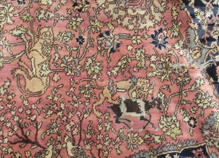 A large rug, decorated with urns, animals and flowers, with similar border, 135ins x 180ins - Image 3 of 6