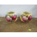A pair of Royal Worcester squat vase, decorated with roses by M Hunt, shape number G161