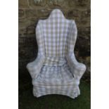 A Georgian design wing back arm chair height 55ins