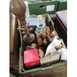 A box of assorted items, to include wooden figures, cats etc