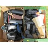 Two boxes of various camera lens etc