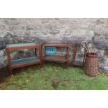 An Oak tea trolley, mid century tea trolley, four division stick stand and a wicker stick stand