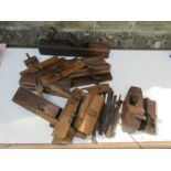 A collection of wood working planes etc