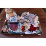 A box of assorted dolls etc