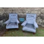 A pair of 19th century fireside chairs having deep buttoned back, raise on turn front legs