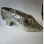 A Dutch silver shoe, decorated with a bow and putti in landscape, weight 4oz