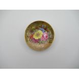 A Royal Worcester pin dish, decorated with flowers in the Dutch style by Freeman, diameter 3.5ins