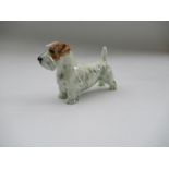 A Royal Worcester model, of a Terrier, Shape No 3028, height 2ins