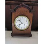 A Junghans A10 mantel clock, in an inlaid mahogany case, 8 movement with white enamel dial