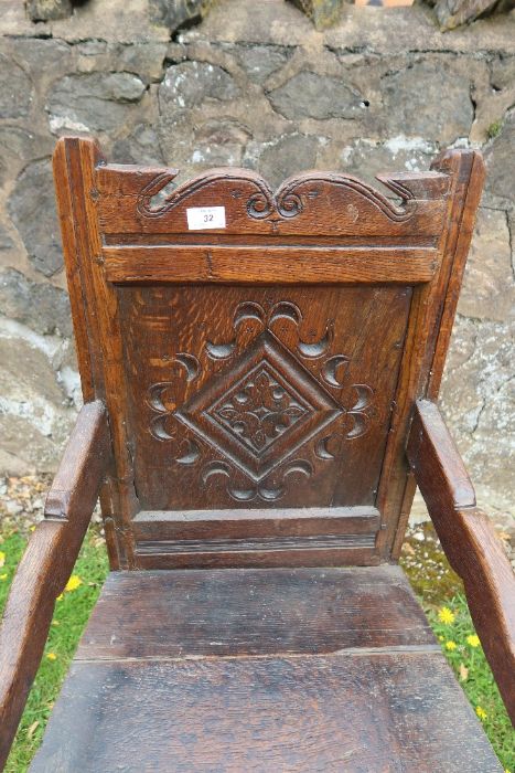 An antique oak Wainscote chair with the back panel having carved decoration. - Image 3 of 3