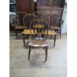 A set of six 19th century yew wood dining chairs, (4+2), pierced splats with bell push moldings, the