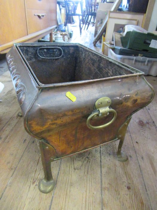 A rectangular copper Art Nouveau coal box, with brass ring handles, raised on four brass feet, width - Image 3 of 3