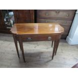 A 19th century mahogany break front fold over tea table, fitted with a drawer , raised on six