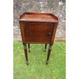 A 19th century Gillows style mahogany pot cupboard raised on reeded legs width 16ins depth 13.