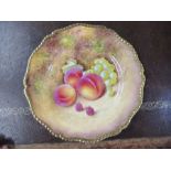 A Royal Worcester cabinet plate, decorated with hand painted fruit by J Reed, diameter 10.5ins -